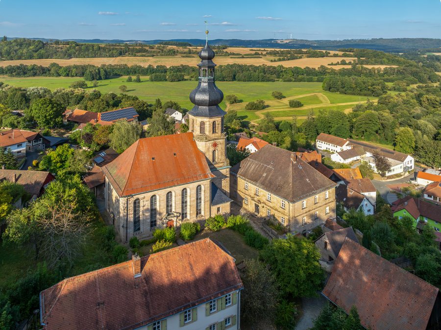 Evangelical Lutheran parish church of St. John in Trebgast, aerial view