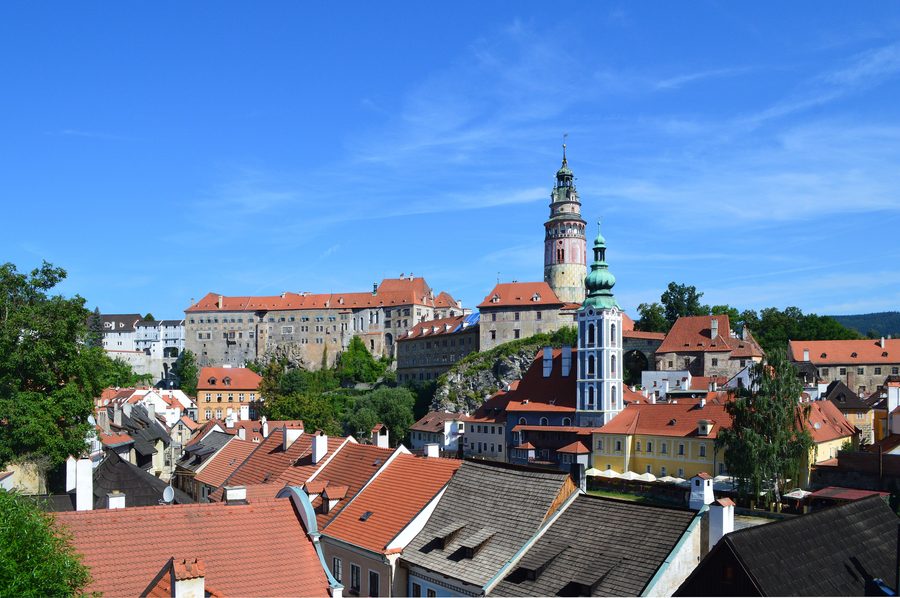 Český Krumlov old town and castle above a bend in the Vltava River.