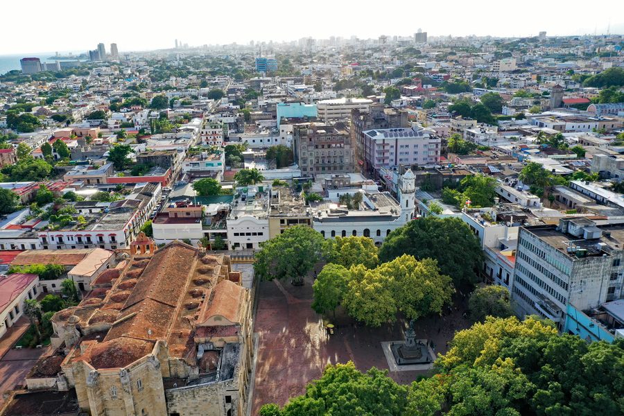 Aerial view of Ciudad Colonial in Santo Domingo with Catedral Primada, Parque Colón and Palacio Consistorial