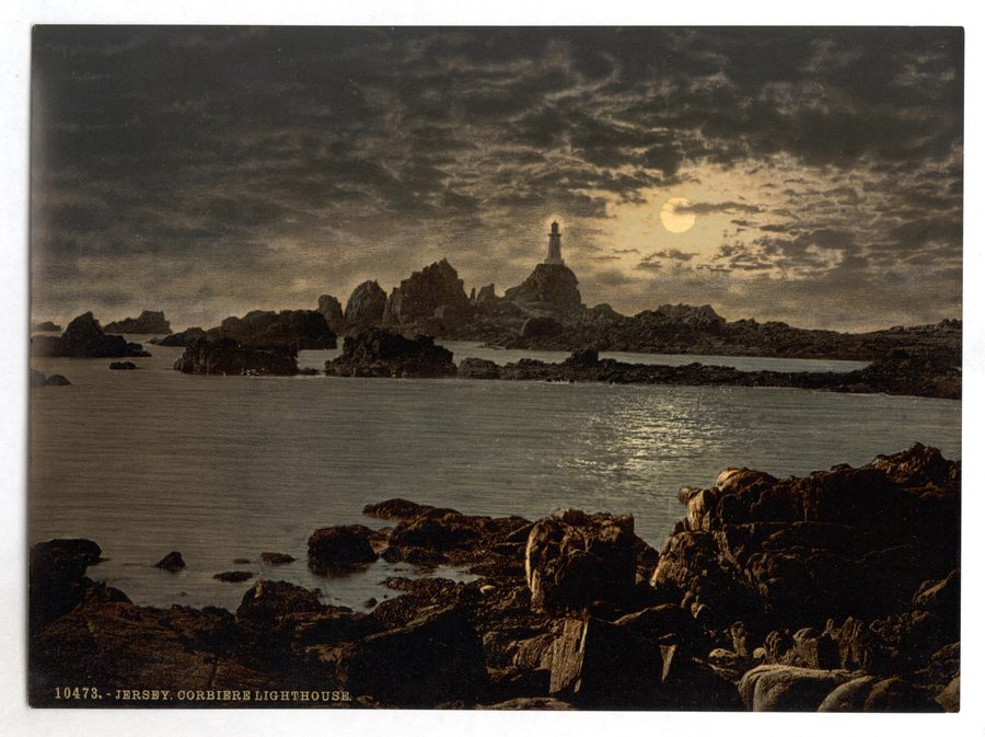 Corbière Lighthouse on Jersey's south-west coast by moonlight.