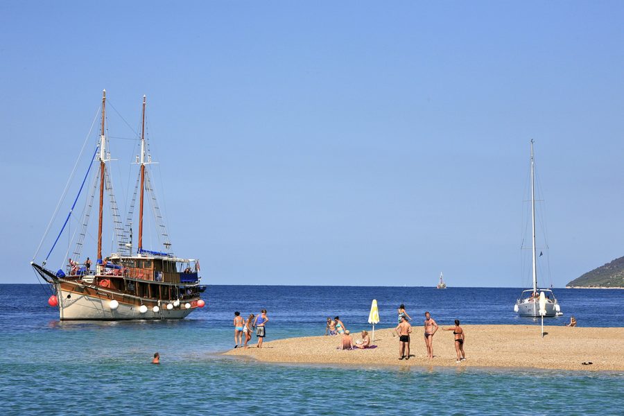 The narrow pebble spit of Zlatni rat stretching into the sea near Bol on Brač.