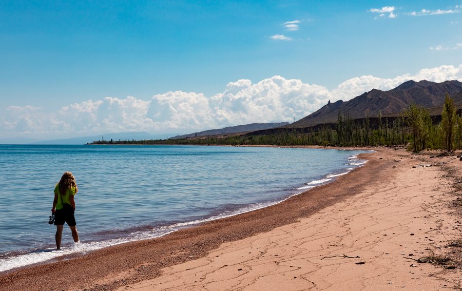 Issyk-Kul Lake beneath the mountains in Kyrgyzstan.