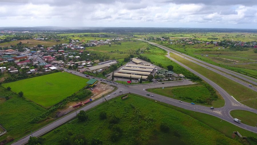 Aerial view of Debe Market beside the highway in Debe, Trinidad.