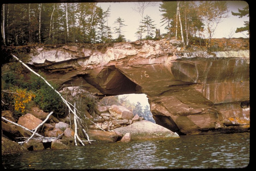 Rocky shoreline and sea caves at Apostle Islands National Lakeshore on Lake Superior.