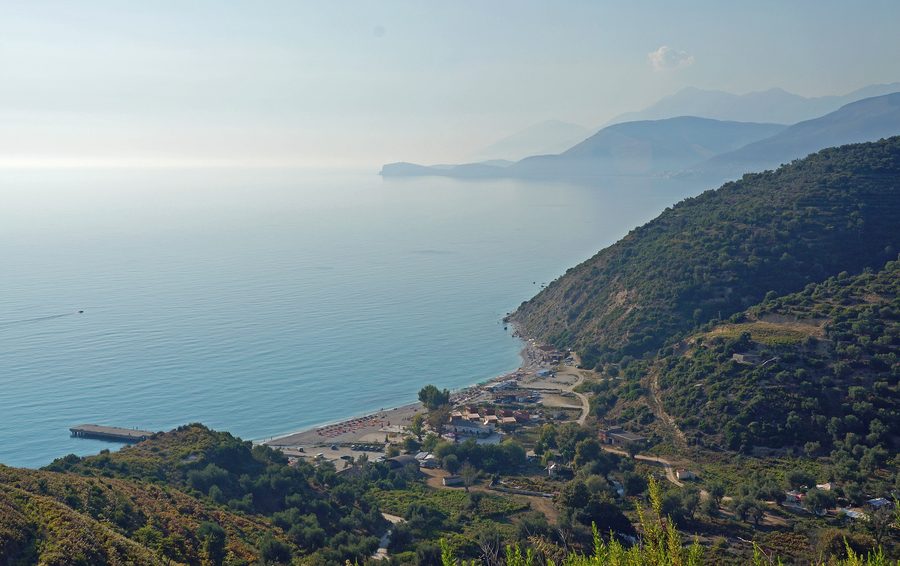 Bunec beach on the Albanian Riviera with clear sea and shoreline