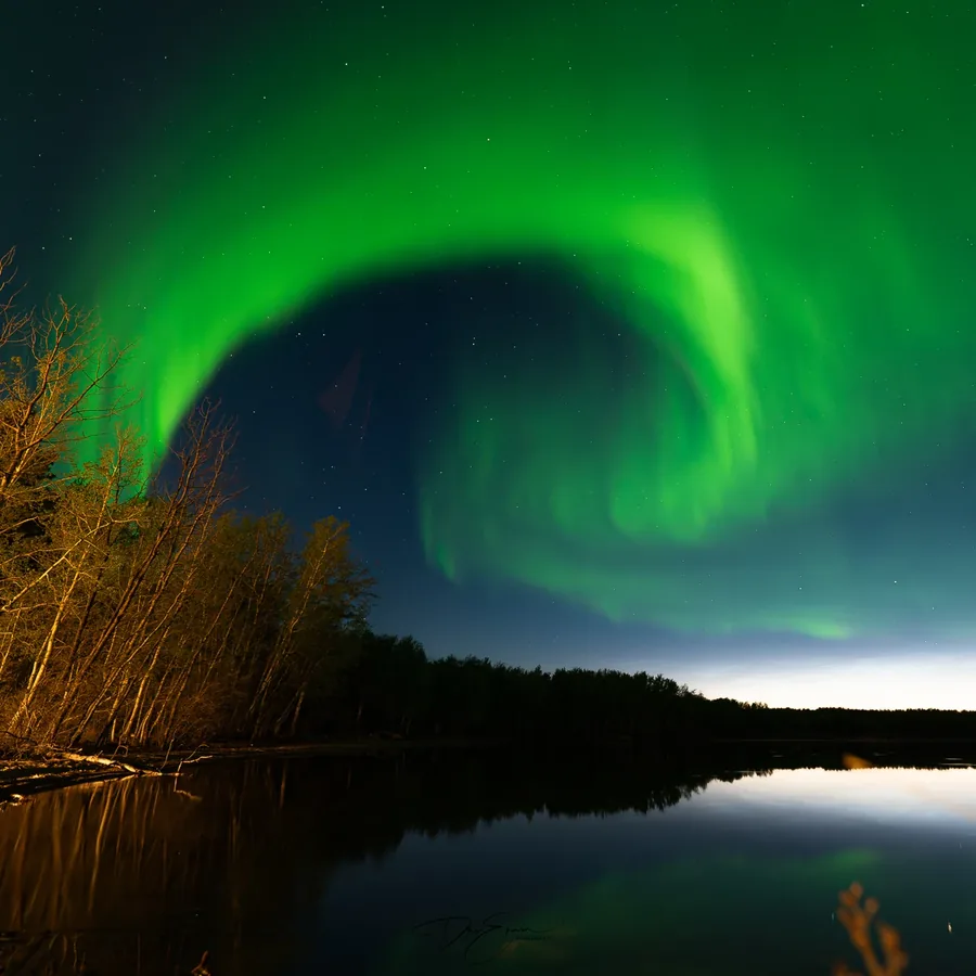 Aurora borealis over Pinehouse Lake in northern Saskatchewan.