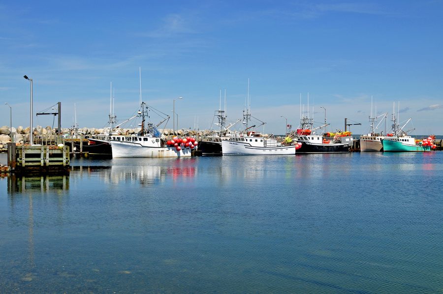 Clark's Harbour on Cape Sable Island, Nova Scotia, with coastal waters and fishing boats