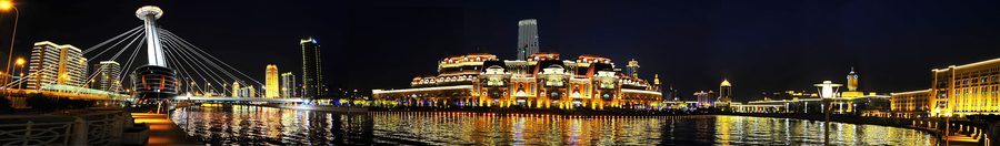 Night view of the Haihe River and Tianjin city skyline.