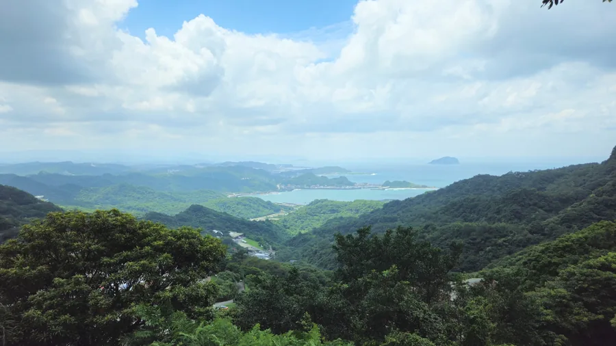 View over Jiufen Old Street toward the coast and Shenao Fishing Port.
