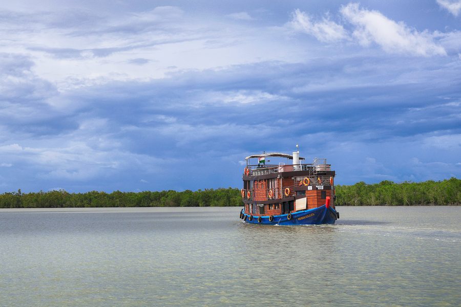 A boat on a waterway in the Sundarbans mangrove forest.