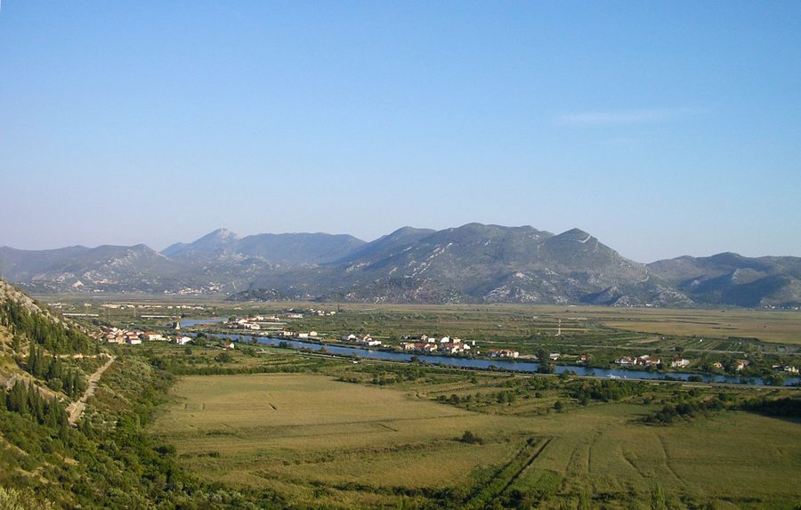 Kula Norinska and Krvavac II along the Neretva River, with Žaba mountain in the background