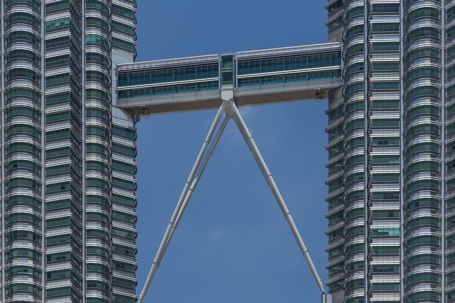 The Petronas Towers rising above the Kuala Lumpur skyline.