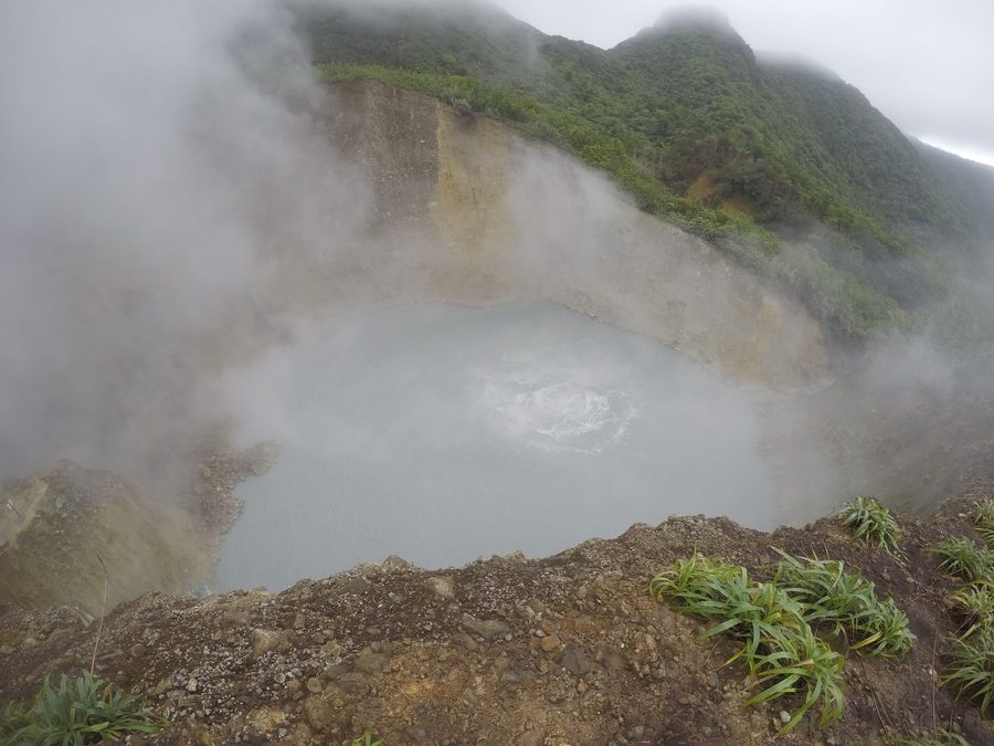Steaming Boiling Lake surrounded by rainforest in Dominica.