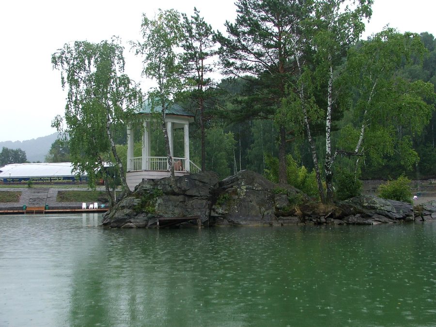 Lake Aya with a small pavilion on an island in Altai Krai.