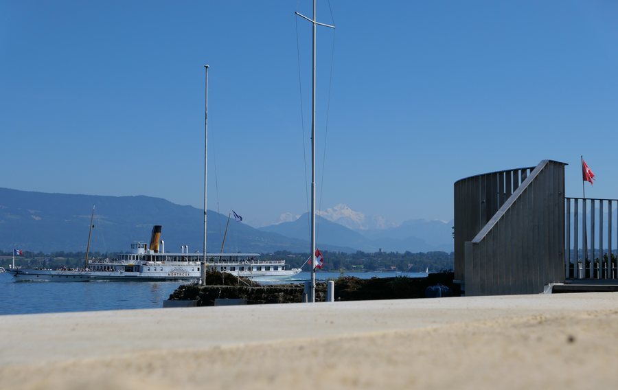 Beach of Versoix with paddle steamer Montreux